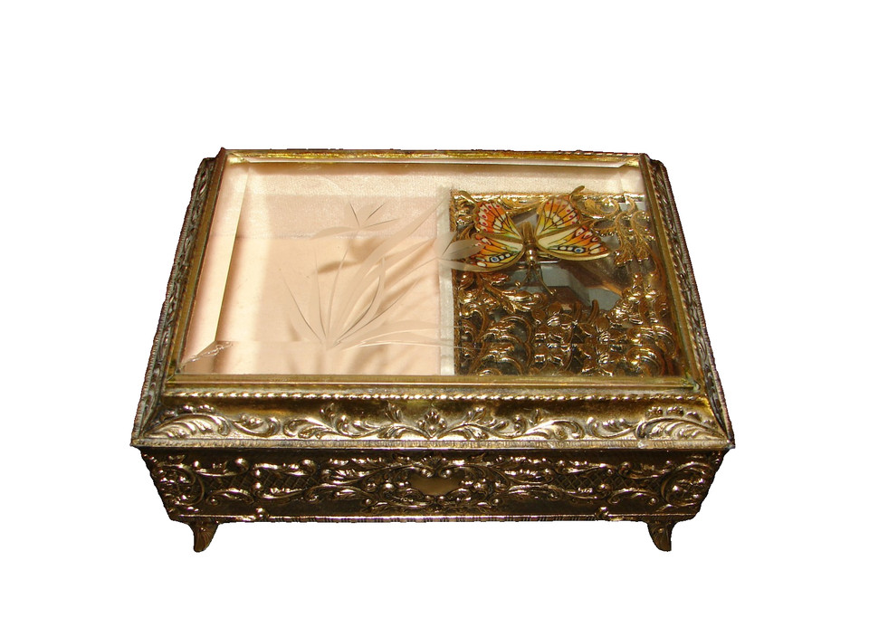 A Westland jewelry music box with hand-painted enamel butterfly wings that actually move and beveled glass panels — this is a showpiece, not just a trinket box.