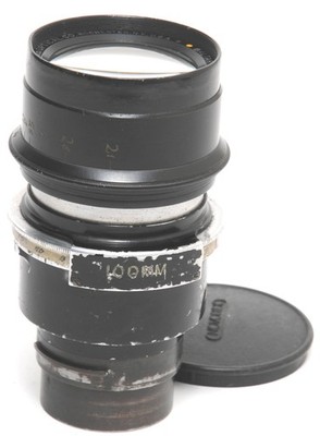 Bausch and Lomb Baltar 2.3/100mm lens Movie Lens covering 24x36 Yellow Dot