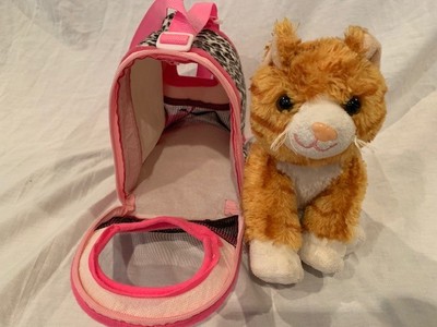 toy cat in carrier