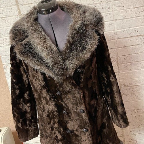 Brown vintage ILGWU winter coat with plush beige fur-lined collar and front button closure on mannequin.