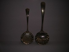 two solid silver sifter spoons