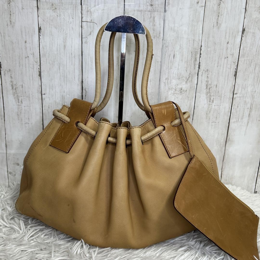 GUCCI embossed logo leather drawstring handbag shoulder bag PGL0MX