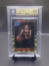 2018-19 Donruss Trae Young Rated Rookie Holo Green & Yellow Laser   BGS 9.5