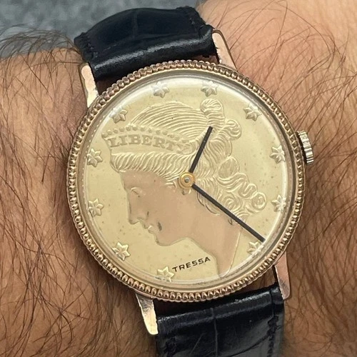 NICE TRESSA LIBERTY COIN WRISTWATCH GOLD PLATED MANUAL WIND MOVEMENT 33MM
