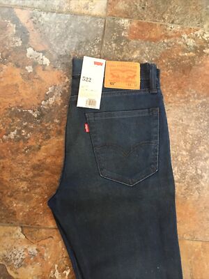LEVI’S JEANS SLIM TAPER 522 MEN’S BLUE SIZE 31W 32L LEATHER EMBLEM AND RED  TAG