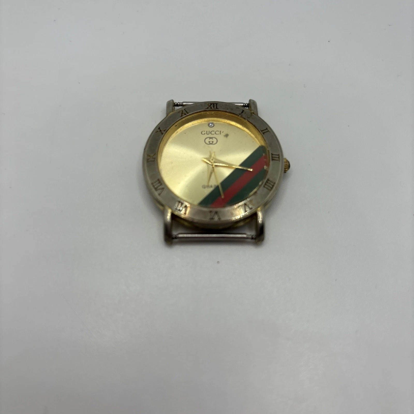 Montre femme GUCCI vintage mouvement suisse dorée sans bracelet pour pièces 