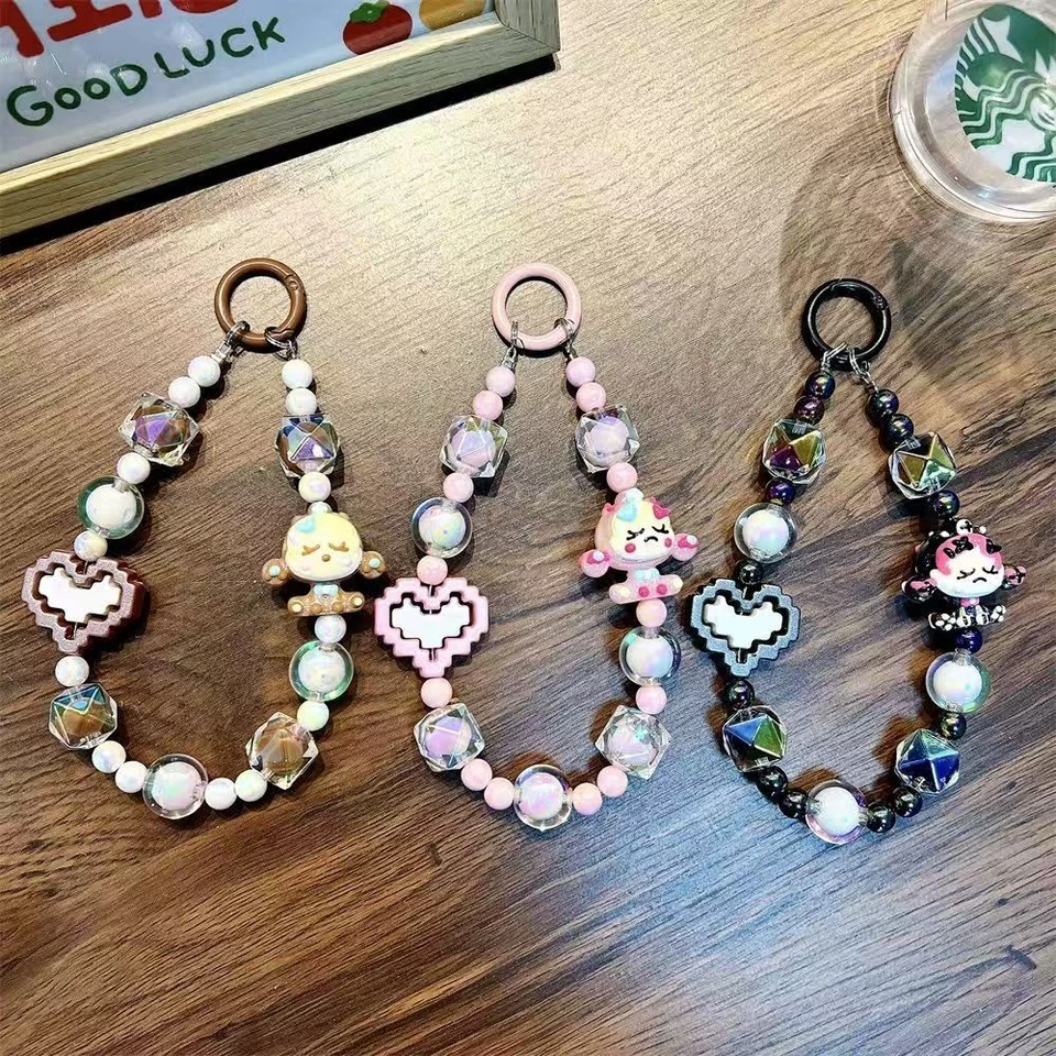 Muñeca de dibujos animados figura bloque cuentas teléfono cordón muñeca correa bolso llavero encanto Foto 2 de 4