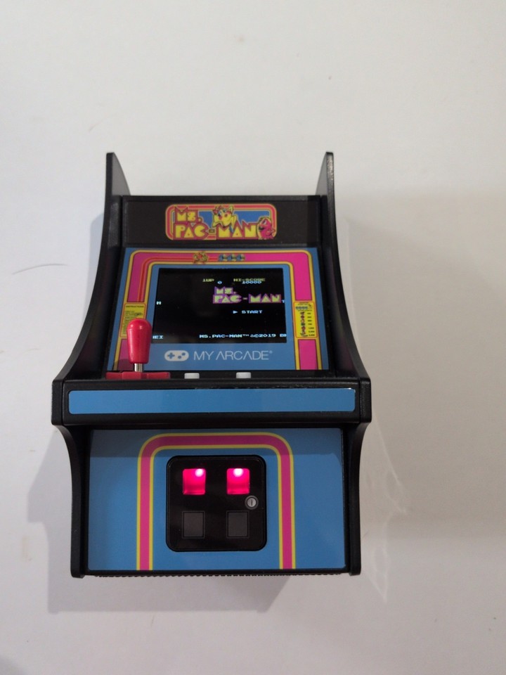 A palm-sized, fully playable Ms. Pac-Man arcade cabinet that's a legit desk trophy AND a working game.
