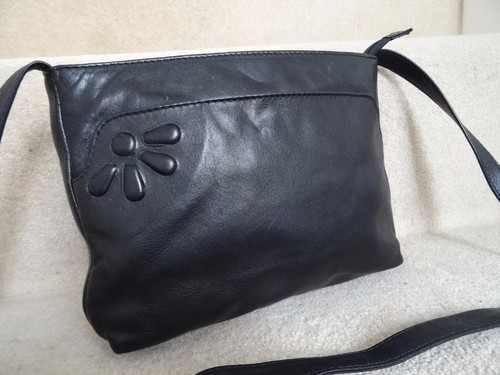 taurus black leather cross body bag shoulder bag in very good