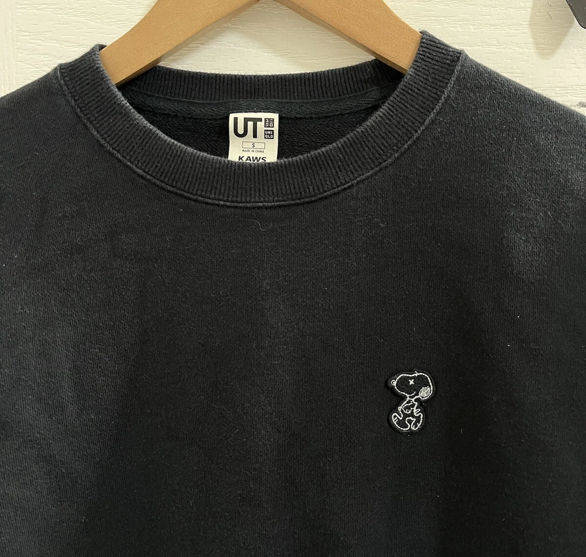 Kaws snoopy sweater hotsell