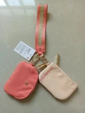 LULULEMON DUAL POUCH WRISTLET RASPBERRY CREAM PINK MIST NWT