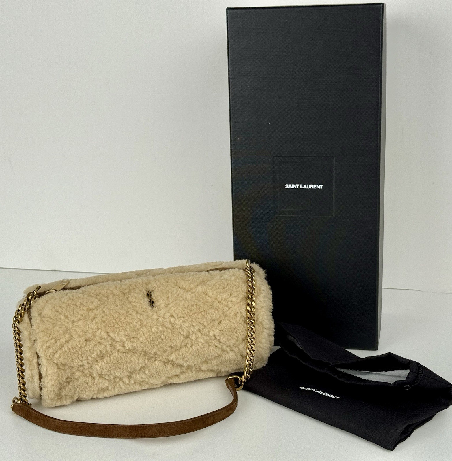 Borsa a tracolla Yves Saint Laurent Small Sade beige trapuntata tubo shearling