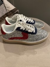 Lucky Step Air-Cooled glitter sneakers feature a bold silver sparkle