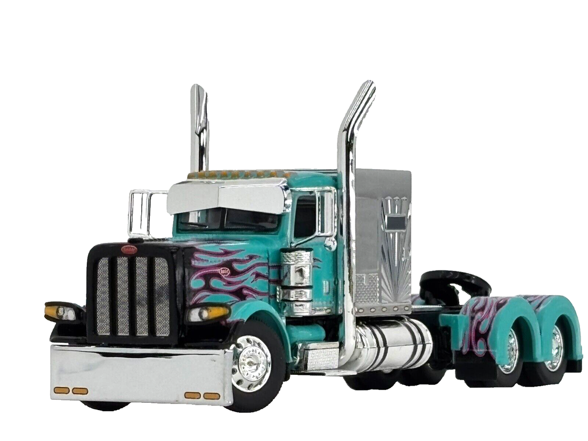 1/64 DCP TEAL/BLACK/PINK PETERBILT 389 W/ 60