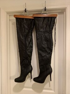report signature thigh high boots
