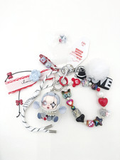Handmade Skullpanda beaded bag charm and keychain rhinestone accents