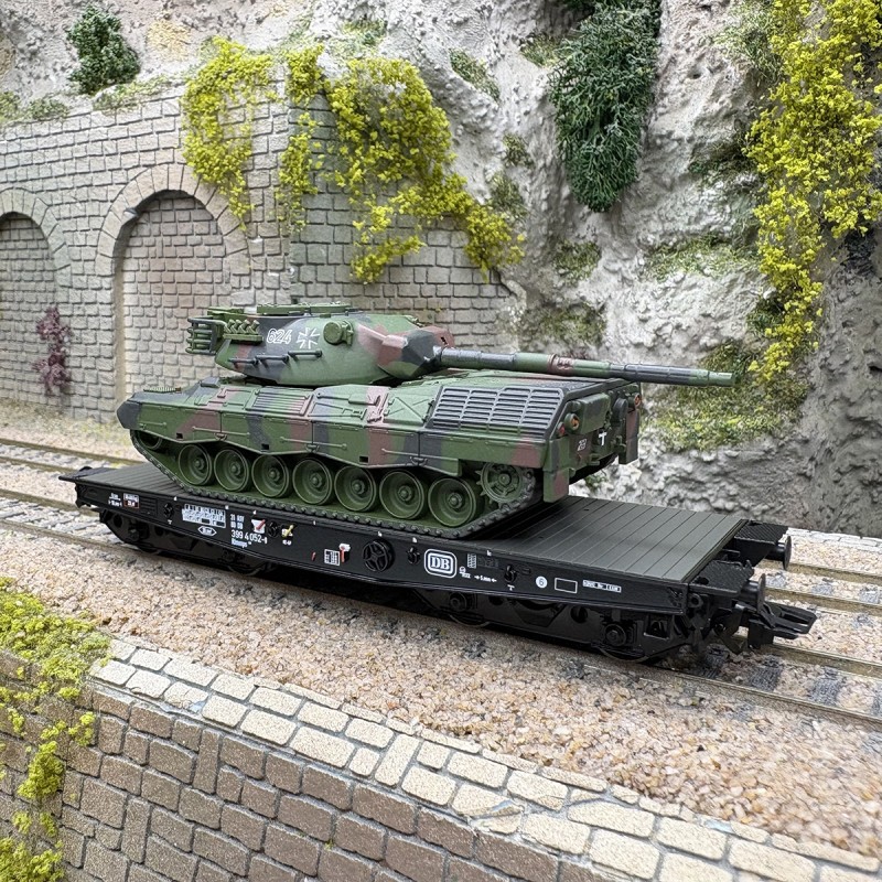 Wagon plat Rlmmps 650 DB avec char Leopard 1A1 miniature Echelle HO Ep IV Märklin