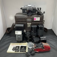 Minolta SRT 201 35mm Film Camera w/ 50mm Lens  Carrying Bag  Extras