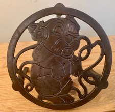 Vintage / Antique Cast Iron Trivet Featuring Bonzo Dog