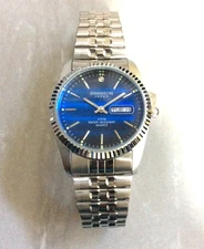 Swanson Men's Watch Round Blue Date Dial on Silver Stretch Band New Item!