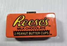 Vintage Retired 1999 Hershey Foods Reese's Cup with Reese's cup trinkets