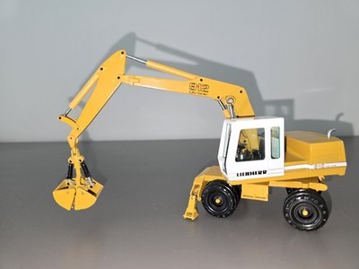 Conrad 1/50 Liebherr 912 Litronic Bagger mit Greifer W. Germany