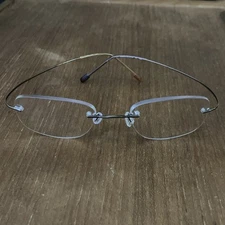 Marchon Airlock 2 140 EYEGLASSES FRAMES 720-42-140 Rimless Titanium Brown