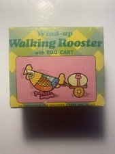 1970  s Tin Litho And Plastic Wind Up Walking Rooster With Egg Cart