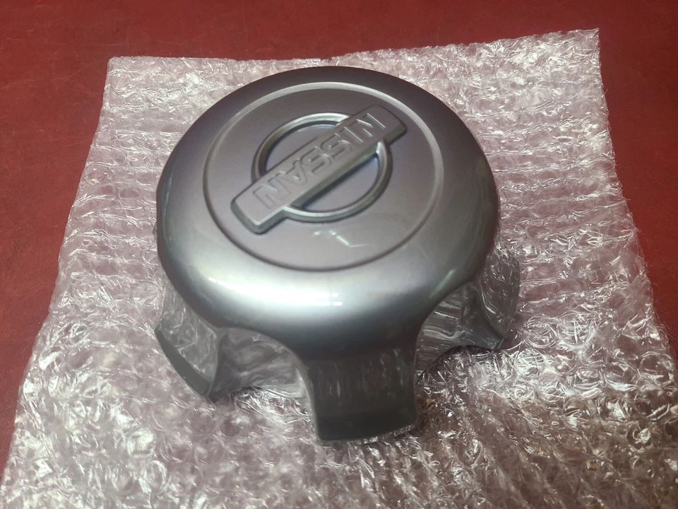 2001-2004 Para Nissan Frontier Calota Central 40315-9Z410 CINZA ESCURO Única NOVA - Imagem 2 de 4