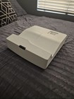 Optoma EH340UST Full HD, Ultra Short Throw Laser Projector — photo 1