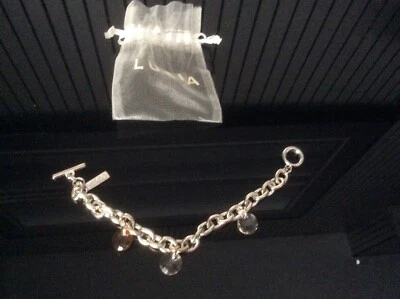Bracelet femme fantaisie avec breloques - Photo 1/2