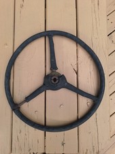 Antique Steering Wheel From A Tractor Or Old Truck