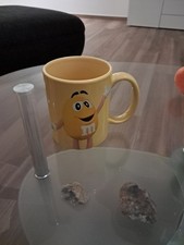 M&M Sammeltasse Gelb Gebraucht Guter Zustand