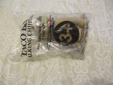 NEW IN BAG TACO BELL CHIHUAHUA WITH ROSE IN MOUTH