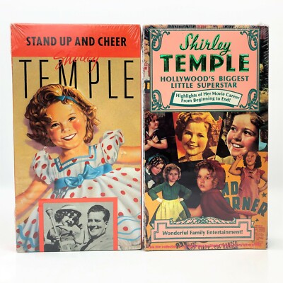 2 Shirley Temple VHS Movies Hollywood's Biggest Little Star & Stand Up And Cheer