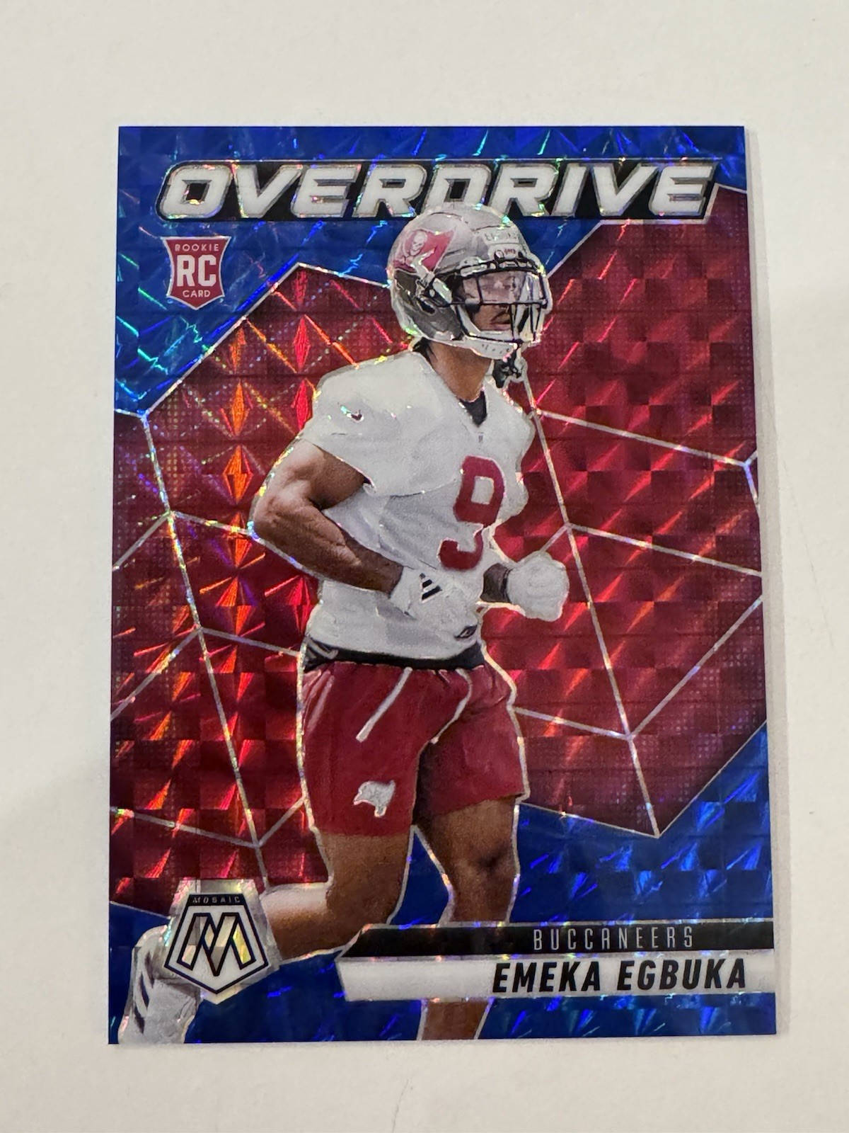 2025-26 Panini Mosaic Emeka Egbuka Overdrive Blue And Red 49/99