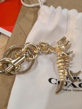Coach Rexy Dinosaur Skeleton Metal Bag Charm Keychain Gold Tone Brass 3D Fob