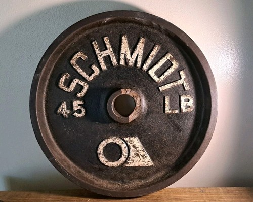 Single Schmidt 45 Pound Vintage Weight Plate. Hub Damaged