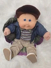 🤎Adorable Toys R Us Exclusive Cabbage Patch Kid, With Original Outfit And Leaf.