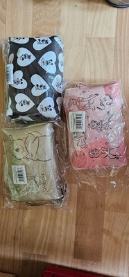 Eine Taschen mit Kerzen und Schmuck Aus Kanada Charmed Aroma Duftkerze NEU
