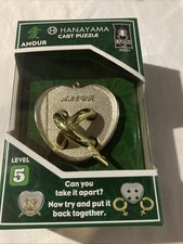 Hanayama Cast Metal AMOUR Level 5 Brain Teaser Puzzle
