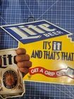 Vintage Miller Lite "It's It and Thats That" Embossed Tin Tacker sign