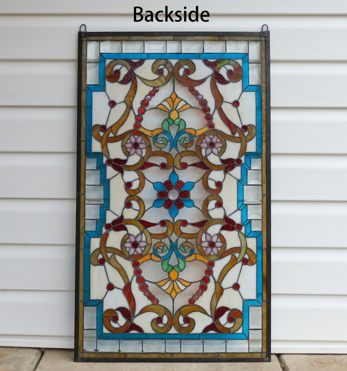 Beveled Tiffany Style stained glass window panel. 20.5