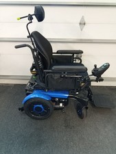 INVACARE STORM TOURQUE RX 20 POWER WHEEL CHAIR WITH ELEVATING SEAT AND TILT