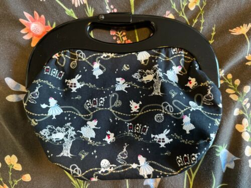 Gorgeous 'Sewsannah' Alice in Wonderland black resin frame clutch bag - Picture 1 of 7