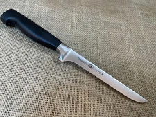 Zwilling J.A. Henckels Four Star 5.5 inch Boning Knife, 31086-140 - VGUC