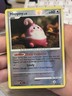 Happiny 52/123 Diamond & Pearl Stamped Reverse Holo Pokémon 2007 MP