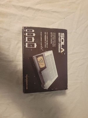 New SOLA Rechargeable Battery Charger Intergrated Hi Yield Solor Panel See Photo