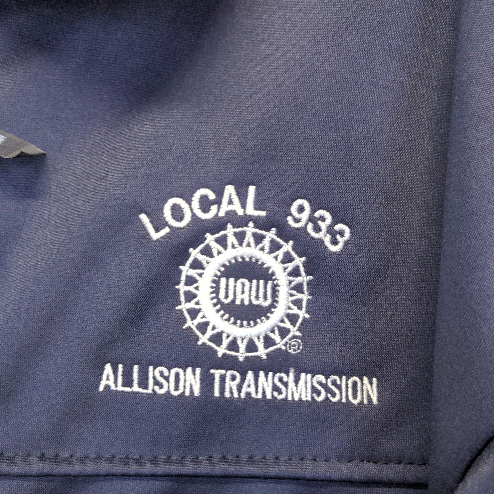 Blue men's full zip jacket with white "LOCAL 933" and "ALLISON TRANSMISSION" text, featuring UA logo on chest.