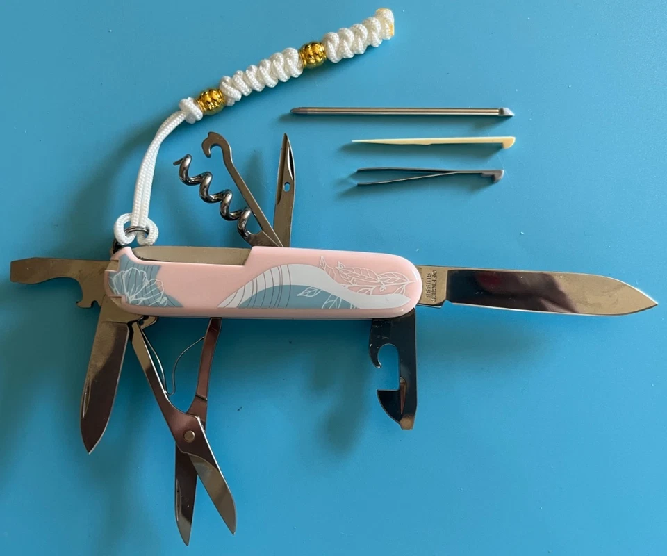 Diseño Victorinox Paris, con bolígrafo y cordón blanco/oro, 91 mm, diseño de color Foto 2 de 4